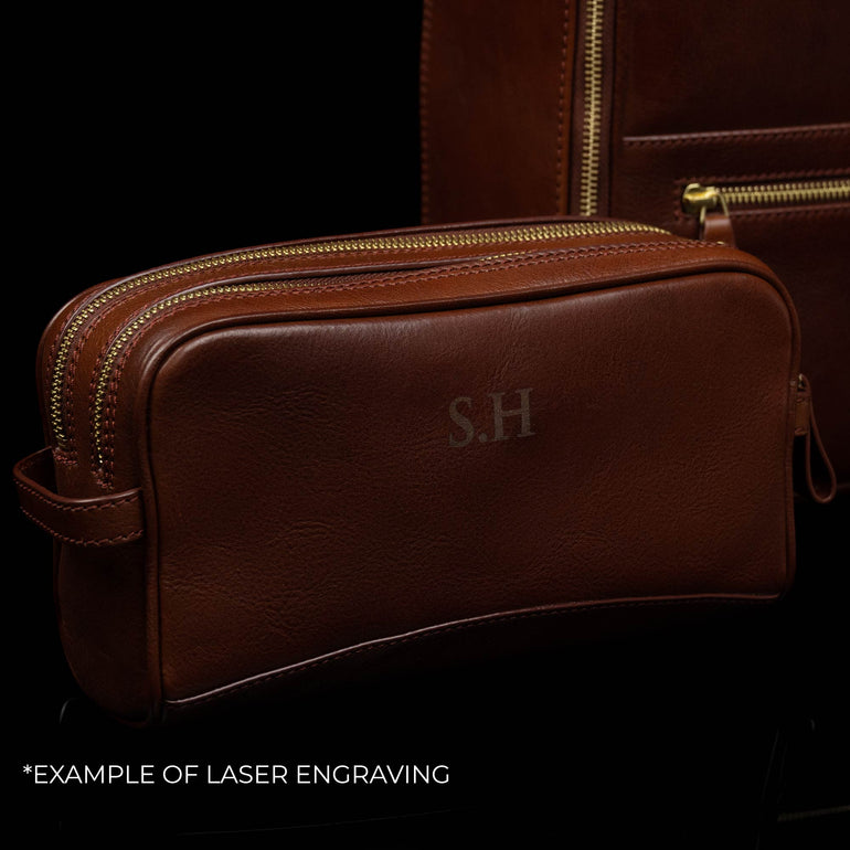 Von Baer Superiore personalizable leather wash bag with engraved initials, example of laser engraving 