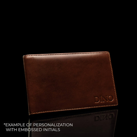 Von Baer travel organizer personalizable leather passport wallet in brown, featuring embossed initials example: DINO.