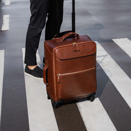 Leather Spinner Luggage Voyager: Luxury Leather Carry On Bag With