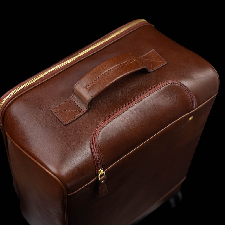Von Baer Voyager luxury brown leather carry-on trolley bag for travel close-up of top handle