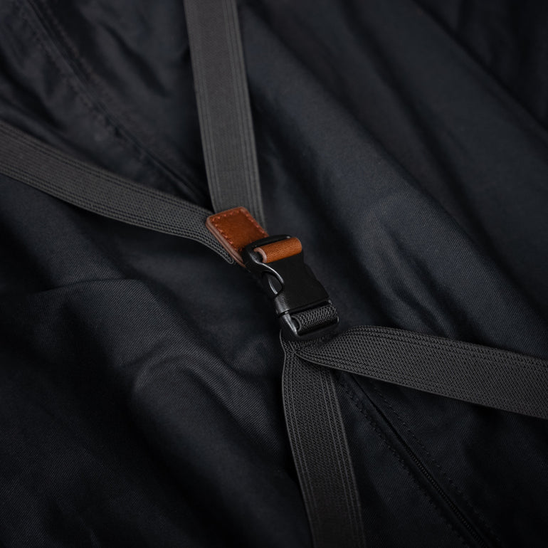Von Baer Voyager luxury leather carry-on trolley bag for travel close-up of packing straps