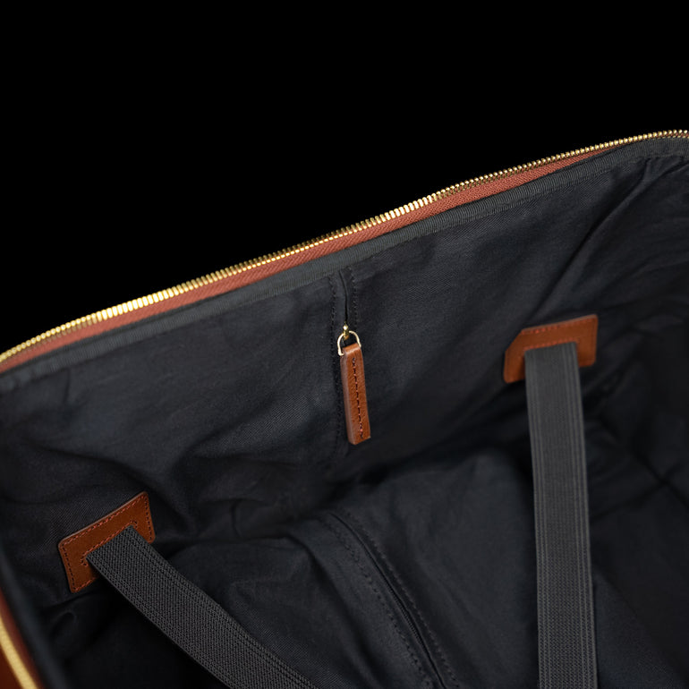 Von Baer Voyager luxury leather carry-on trolley bag for travel showing interior service zipper and handle mechanism