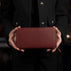 Von Baer W2 large modern leather women's purse wallet - red - front view in the hand of female model.