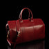 weekend bag deep red color with shoulder strap