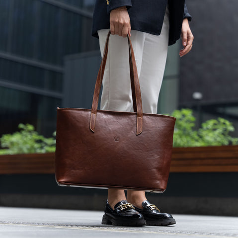 von baer womens elegance large leather tote bag brown with female model holds in hands