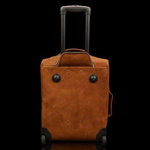 voyager leather carry on bag with wheels cognac light brown back view with wheels drawer out