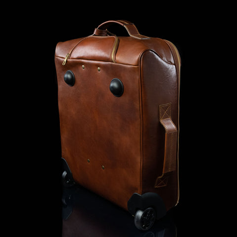 voyager leather carry on bag with wheels solid brown back front view for men