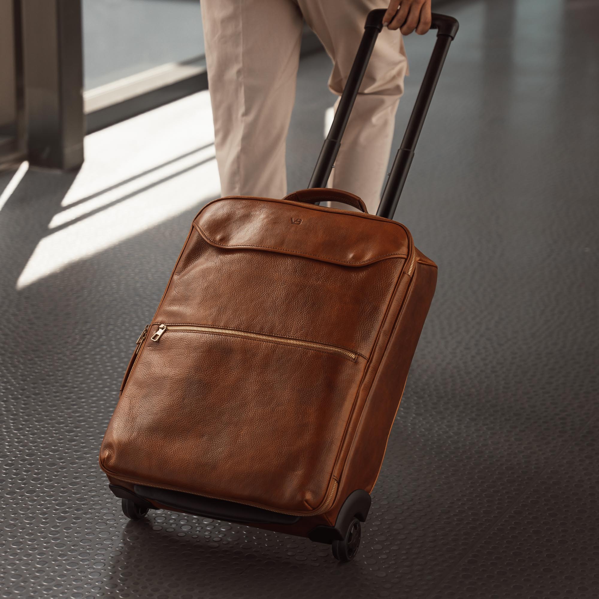 Leather carry on suitcase with wheels sales
